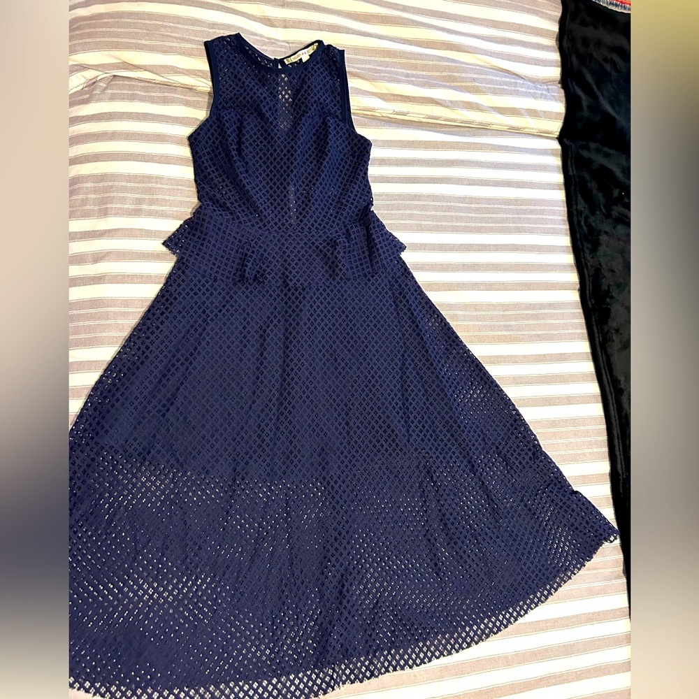 Beautiful net dress dark blue. See through around the waist and below knees